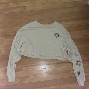 Garage cream and black long sleeve cropped tee.